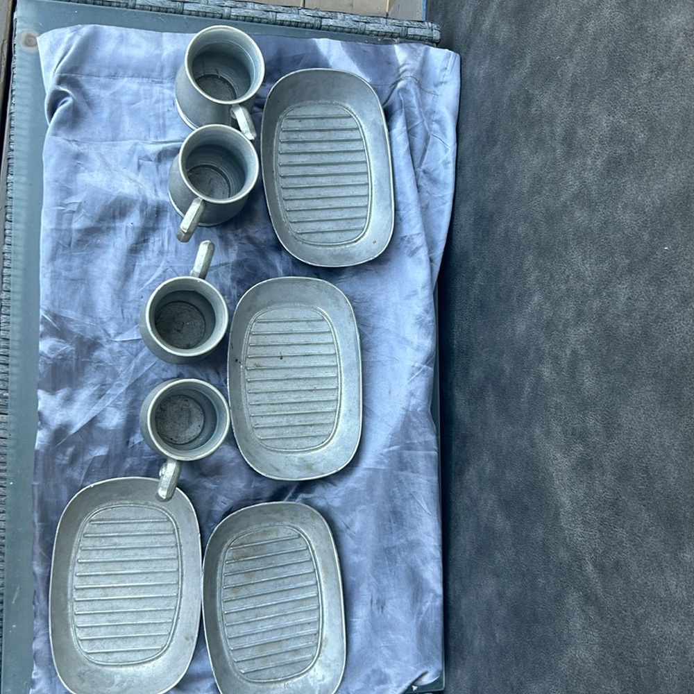 Armatale pewter tankards and plates serving set